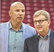  ??  ?? ASSOCIATED PRESS Bucks head coach Jason Kidd (left) said there is no friction with general manager John Hammond. The GM stated they have a good working relationsh­ip.