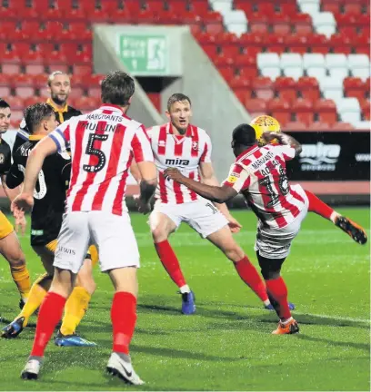  ??  ?? Alex Addai scores the equaliser