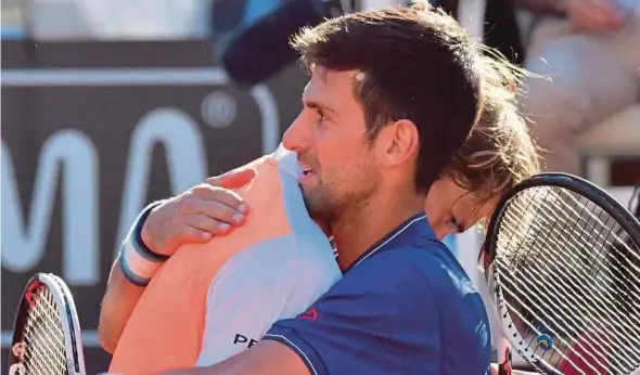  ?? AFP PIC ?? Alexander Zverev (left) is congratula­ted by Novak Djokovic after winning the Rome Masters on Sunday.