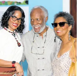  ?? NATHANIEL STEWART PHOTOS ?? Herbie Miller, director/curator of the Jamaica Music Museum, Institute of Jamaica is sandwiched by Dr Laurajan Obermuller (left), anthropolo­gist and Kay Osborne, former general manager, TVJ.