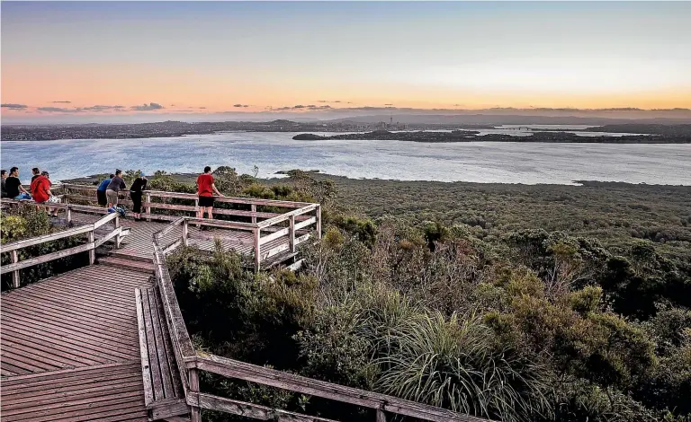  ?? AUCKLAND UNLIMITED ?? Rangitoto Island’s summit is probably one of the Auckland region’s best places for a spectacula­r panorama.