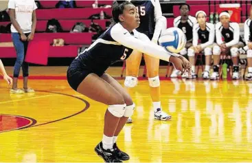  ?? Diana L. Porter / For the Chronicle ?? Jaz’Myne Perry of Lamar has emerged as one of the offensive stars for the Texans this season under first-year coach Terry Lambert. Lamar faces rival Bellaire this Friday in a key district volleyball matchup.