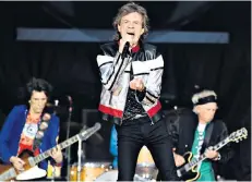  ??  ?? Still rocking: Ronnie Wood, Mick Jagger and Keith Richards on stage last year