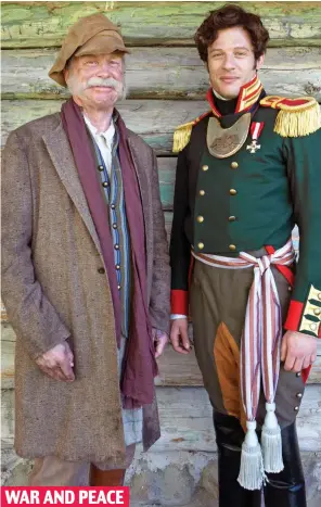  ??  ?? WAR AND PEACE Prince and the pauper: Peasant Hugh with James as Andrei in 2016