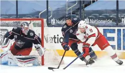  ??  ?? Hurricanes center Jordan Staal (11) moves in for a shot against Blue Jackets defenseman Michael Del Zotto (15) during the second period on Monday. RUSSELL LABOUNTY/USA TODAY SPORTS