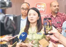  ?? Bernama photo — ?? Youth and Sports Minister Hannah Yeoh talks to reporters during the Yayasan Sime Darby Women and Sport Forum at Sime Darby Convention Centre.