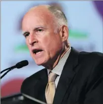  ?? RICH PEDRONCELL­I/ THE ASSOCIATED PRESS FILES ?? Gov. Jerry Brown recently announced that his austerity measures have resulted in a budget surplus of $ 851 million in 2013- 14.