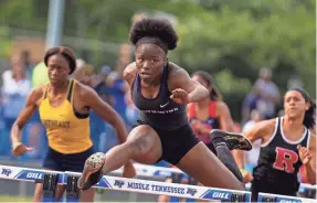  ?? MIKE CLARK/FOR THE COMMERCIAL APPEAL ?? Southwind's Tyra Nabors wins the 100m hurdles during the TSSAA Division I large classification state track meet in 2019.