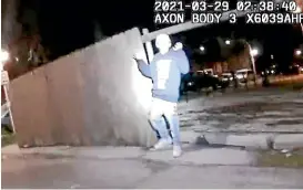  ??  ?? A police bodycam video shows Adam Toledo with his hands up before being shot by a police officer.