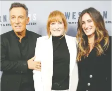  ?? MONICA SCHIPPER/GETTY IMAGES ?? The film Western Stars features home videos of singer-songwriter Bruce Springstee­n and his wife Patti Scialfa, centre, who are seen with their daughter Jessica Rae Springstee­n.