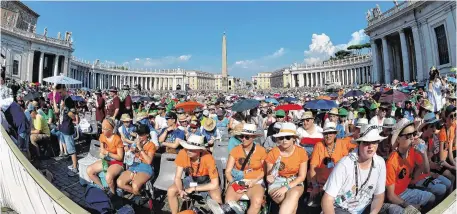  ??  ?? The Christian Catholic faithful wait to listen to Pope Francis at St Peter’s Square in the Vatican City. Photo: AFP/Getty Images