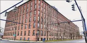  ?? Paul Buckowski / Times Union archive ?? The Standard Manufactur­ing building in Troy, which closed in March 2020, was the home of the Arakelian family’s apparel and jacket-making business. The location has been slated for affordable housing units.