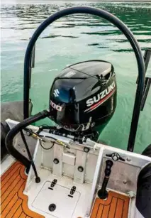  ??  ?? BELOW A Suzuki 100hp fourstroke outboard provides ample performanc­e for this 6m RIB.