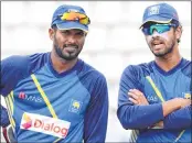  ??  ?? Sri Lanka captain Upul Tharanga with Dinesh Chandimal