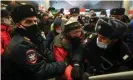  ?? Photograph: Sergei Bobylev/TASS ?? Police detain a man at Vnukovo internatio­nal airport