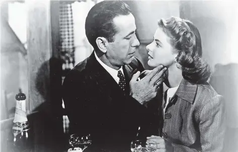  ?? FOTO: DPA ?? Wenn Bilder seufzen könnten: Ingrid Bergman als Ilsa Lund und Humphrey Bogart als Rick in „Casablanca“(1942).