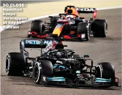  ??  ?? SO CLOSE: Hamilton keeps Verstappen at bay in Bahrain