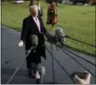  ?? EVAN VUCCI — ASSOCIATED PRESS ?? President Donald Trump speaks to reporters Tuesday before leaving the White House for a Thanksgivi­ng trip to his Mar-aLago estate in Palm Beach, Fla.