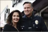  ?? CHRIS PIZZELLO — THE ASSOCIATED PRESS FILE ?? Actor Lynda Carter, left, poses with former Los Angeles Police Department Capt. Cory Palka during a ceremony to award her a star on the Hollywood Walk of Fame in Los Angeles on April 3, 2018.