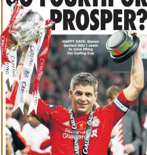  ??  ?? HAPPY DAYS: Steven Gerrard didn’t seem to mind lifting the Carling Cup