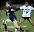  ?? ?? Roosevelt forward Ireland Churchill, lelft, is taken down by Santiago midfielder Katrina Marsh.