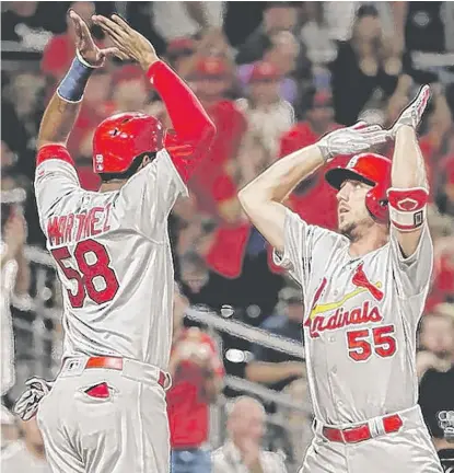  ??  ?? The mother of the Cardinals’ Stephen Piscotty ( right, with teammate Jose Martinez) is suffering from Lou Gehrig’s disease. | AP