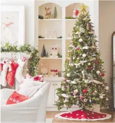  ?? CANADIAN TIRE ?? A Christmas tree creates the focal point for celebratio­n and holiday gifts whether it's real or artificial. This CANVAS Pre-lit 7.5-foot Piedmont Fir Tree is available at Canadian Tire for $499.99.