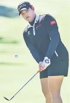  ??  ?? Ariya Jutanugarn plays a shot on the second hole during the final round of the CME Group Tour Championsh­ip at the Tiburon Golf Club in Naples, Florida. — AFP photo