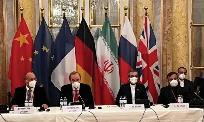  ?? Photograph: EU delegation in Vienna/AFP/Getty Images ?? Representa­tives from Iran and the EU at the nuclear talks in Vienna this week.