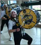  ?? HYOUNG CHANG — THE DENVER POST ?? Rachel Wood, left, and other members of the Skyline Drumline welcome Denver Nuggets fans at Ball Arena on May 18, when the Nuggets were hosting the Los Angeles Lakes for Game 2 of the NBA Western Conference Finals.