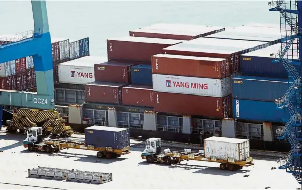  ??  ?? Biggest partner: A file picture showing trade activities at Port Klang. China continued to be Malaysia’s largest trading partner for the ninth consecutiv­e year since 2009.