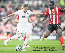  ??  ?? > Gylfi Sigurdsson’s goals have proved vital this term