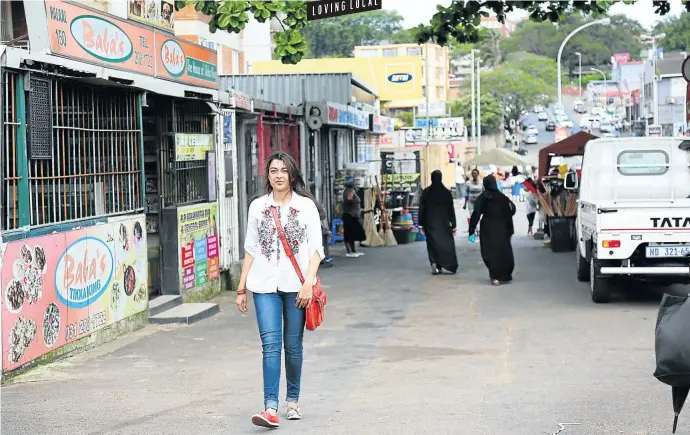  ?? Pictures: Jackie Clausen and Shubnum Khan ?? Shubnum Khan on the streets of Overport, above, and Pragnesh and Jaya Bhatt, below, with some of the delicacies on offer in their vegetarian takeaway.