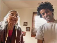  ?? Associated Press ?? ■ Arman Ramnath poses with his grandmothe­r, Vijaya Ramnath, on Feb. 14 in Columbus, Ohio. The 27-year-old has been nervous about getting near his older grandmothe­r during the coronaviru­s pandemic. Arman, a Georgetown University Law School student, is studying remotely but sometimes must visit school such as to pick up books.