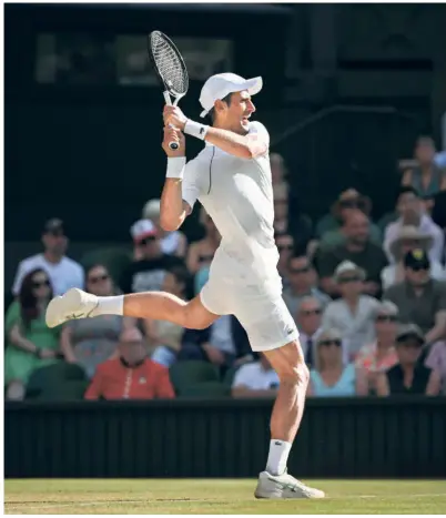  ?? GETTY IMAGES ?? Speed and power:
Scorching two-handed backhand strokes such as the one deployed by Novak Djokovic can defuse explosive serves and produce excellent passing shots off sharp volleys. It’s another reason why very few risk serve and volleying now.