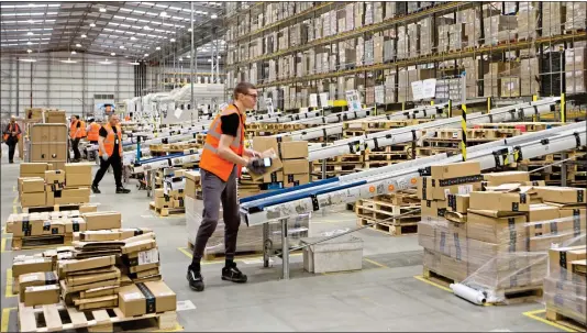  ??  ?? HUGE OPPORTUNIT­Y: With customers such as Amazon, mega-warehouse firms are well placed to cash in on the growth in online shopping