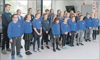  ??  ?? Caol and St Columba’s primary schools’ joint choir sang two songs for family and friends.