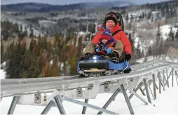  ??  ?? In Steamboat, the newly installed Outlaw Mountain Coaster, the longest coaster in North America at more than 6,280 feet, replicates the thrill of downhill ski racing or rodeo barrel racing.