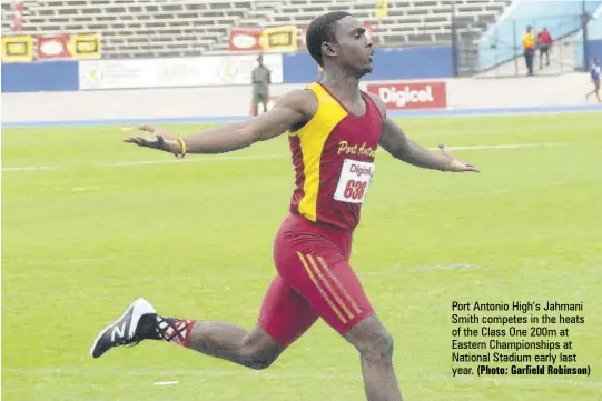  ?? (Photo: Garfield Robinson) ?? Port Antonio High’s Jahmani Smith competes in the heats of the Class One 200m at Eastern Championsh­ips at National Stadium early last year.