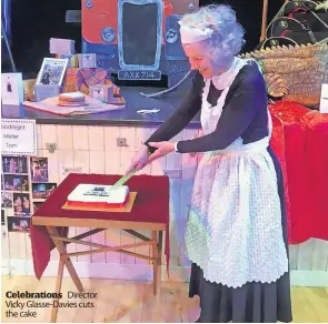  ?? ?? Celebratio­ns Director Vicky Glasse-Davies cuts the cake