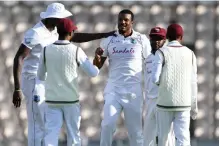  ?? AFP ?? West Indies’ Shannon Gabriel, centre, celebrates after the dismissal of England’s Ollie Pope in Southampto­n