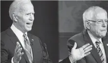  ?? Doug Mills / New York Times ?? Former Vice President Joe Biden and Sen. Bernie Sanders take part in the second night of the Democratic debate Thursday.