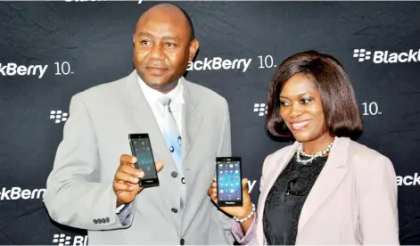  ?? PHOTO: ?? Charles Asinugo [L],Territory Director, East,West Central & Southern Africa and Ugonma Akhigbe, Channel Marketing Manager, West Africa during the launch of Blackberry z3 in Nigeria in Lagos, Thursday.
OLADIPUPO ODUNEWU