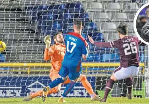  ??  ?? Miles Storey grabbed the opener for Caley Jags on Friday night as interim boss Neil Mccann watched on