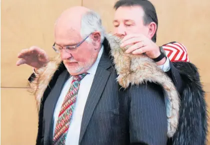  ?? ?? Mayor of Horowhenua Bernie Wanden places a korowai on the shoulders of newly appointed Deputy Mayor David Allan.