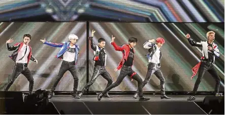  ??  ?? Only six members from EXO were on hand to entertain fans at the K-pop group’s recent show in Malaysia. — Star Planet