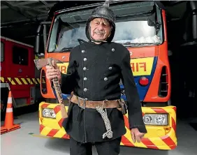  ?? PHOTO: SCOTT HAMMOND/STUFF ?? Raynor Henson in his original woollen firefighti­ng uniform.