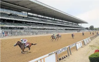  ?? SETH WENIG
THE ASSOCIATED PRESS ?? Tiz the Law, with jockey Manny Franco, crosses the finish line in front of an empty grandstand to win the 152nd running of the Belmont Stakes on Saturday in Elmont, N.Y.