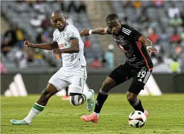  ?? Sydney Mahlangu/BackpagePi­x ?? Ben Motshwari of AmaZulu challenges Tshegofats­o Mabasa of Orlando Pirate during their DStv Premiershi­p 2023-24 match at Orlando Stadium last night.