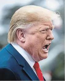  ?? PETE MAROVICH NEW YORK TIMES ?? President Donald Trump speaks to reporters as he leaves the White House en route to Florida on Thursday.